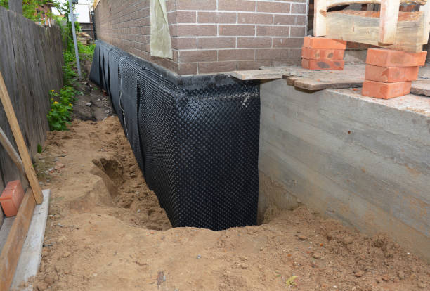 Happy homeowners after waterproofing job in Fowlerton